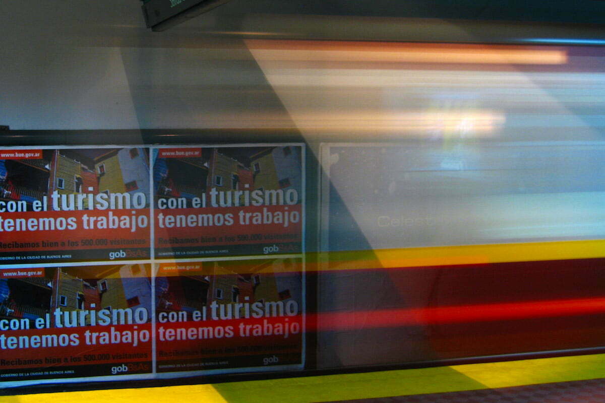 A metro train blurs as it leaves a station in Buenos Aires, Argentina.