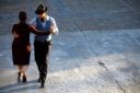 A man and woman dance the tango in Buenos Aires, Argentina