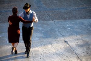 A man and woman dance the tango in Buenos Aires, Argentina
