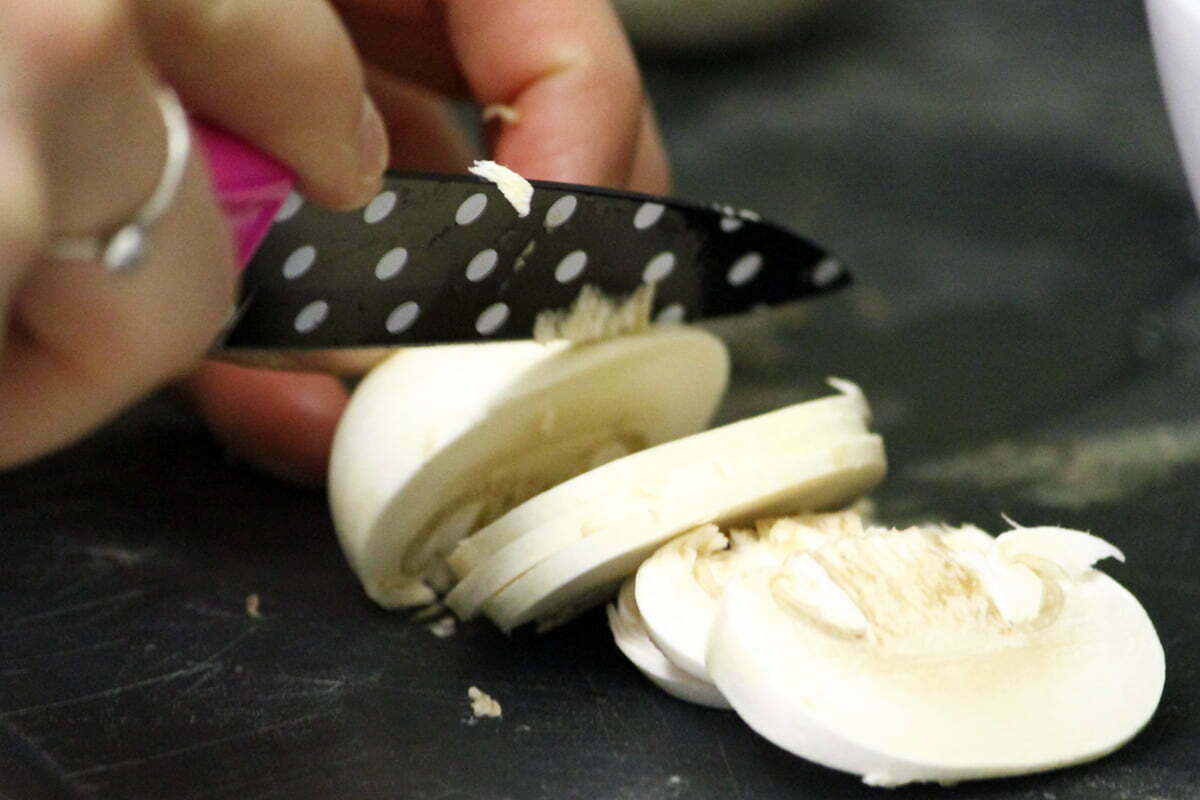 Sally cuts a mushroom for the frittata.