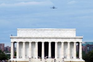 The space shuttle Discovery does a fly by over the Lincoln Memorial in Washington DC before being retired.