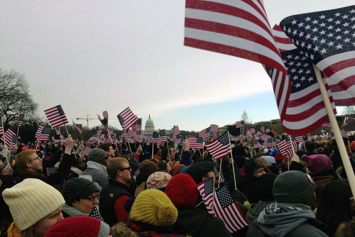 American flags wave during the second presidential inauguration of Barack Obama.