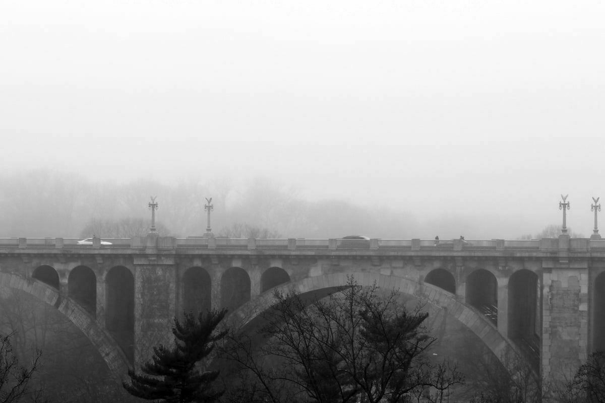 A foggy view over the Taft Bridge in Washington DC.