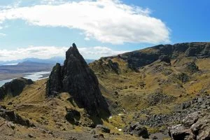 A panoramic view of the mountains and landscape seen from a hike to Old Man of Storr in Isle of Skye, Scotland.
