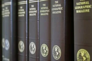 A row of bound book versions of The National Geographic Magazine.