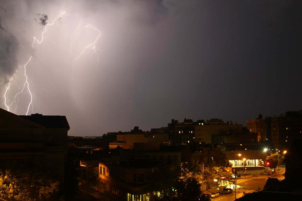 A huge bolt of lightning strikes during a heat storm over Adams Morgan in Washington DC.
