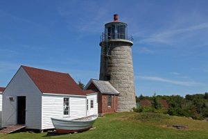The conical stone lighthouse on Monhegan Island in Maine.