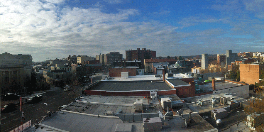 A clear view over Adams Morgan that transitions to the same view on a snowy day.