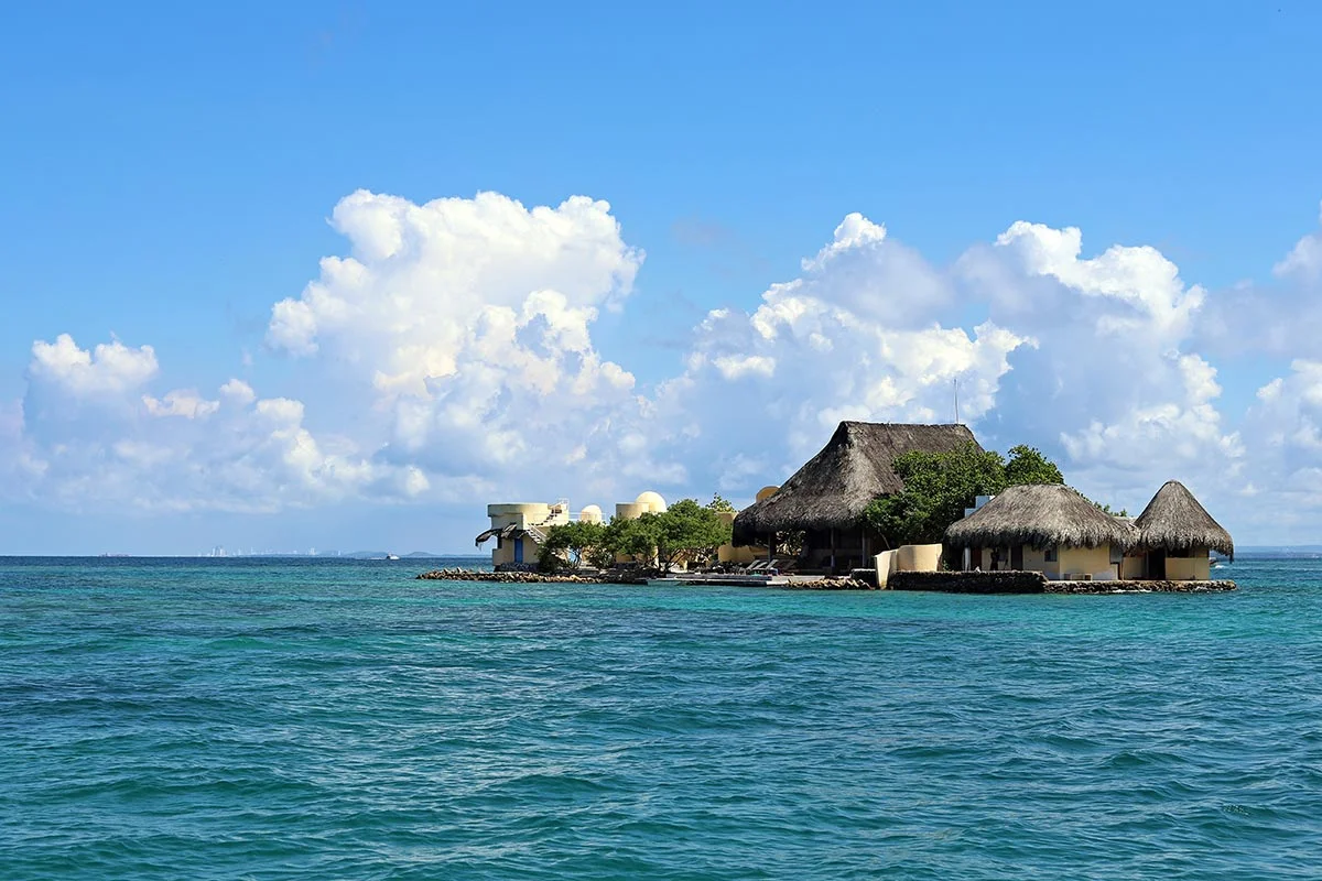 One of the tiny Rosario Islands in the archipelago off the coast of Colombia with Cartagena visible on the horizon.